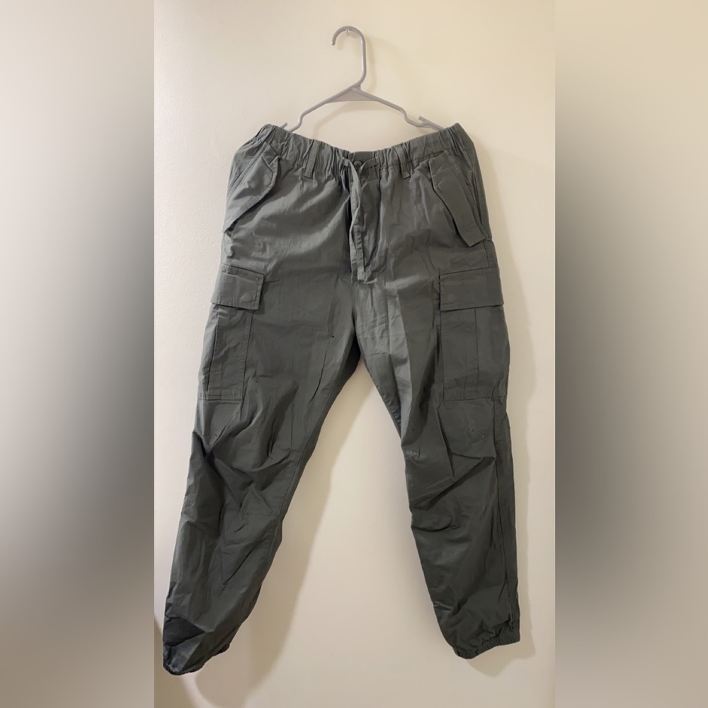 Khaki green cargo pants.